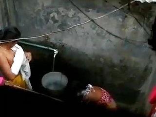 Indian housewife bathing